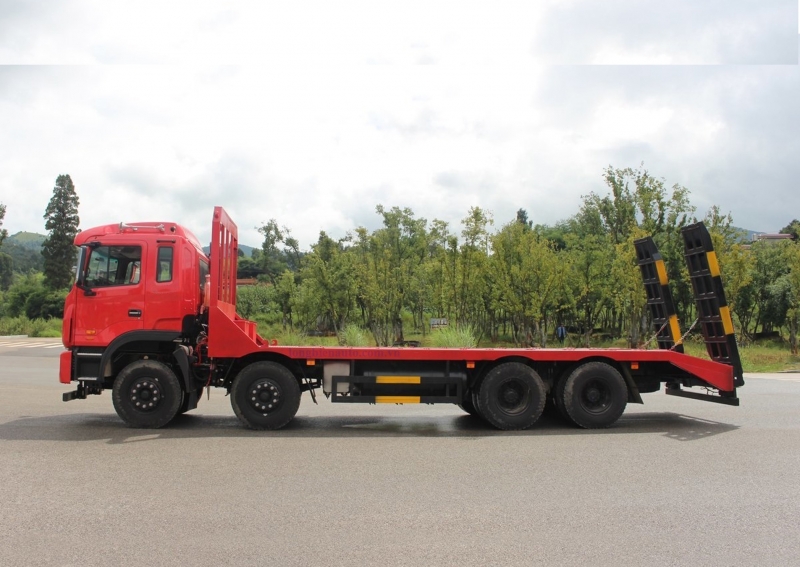 Xe nâng đầu chở máy xúc 4 chân